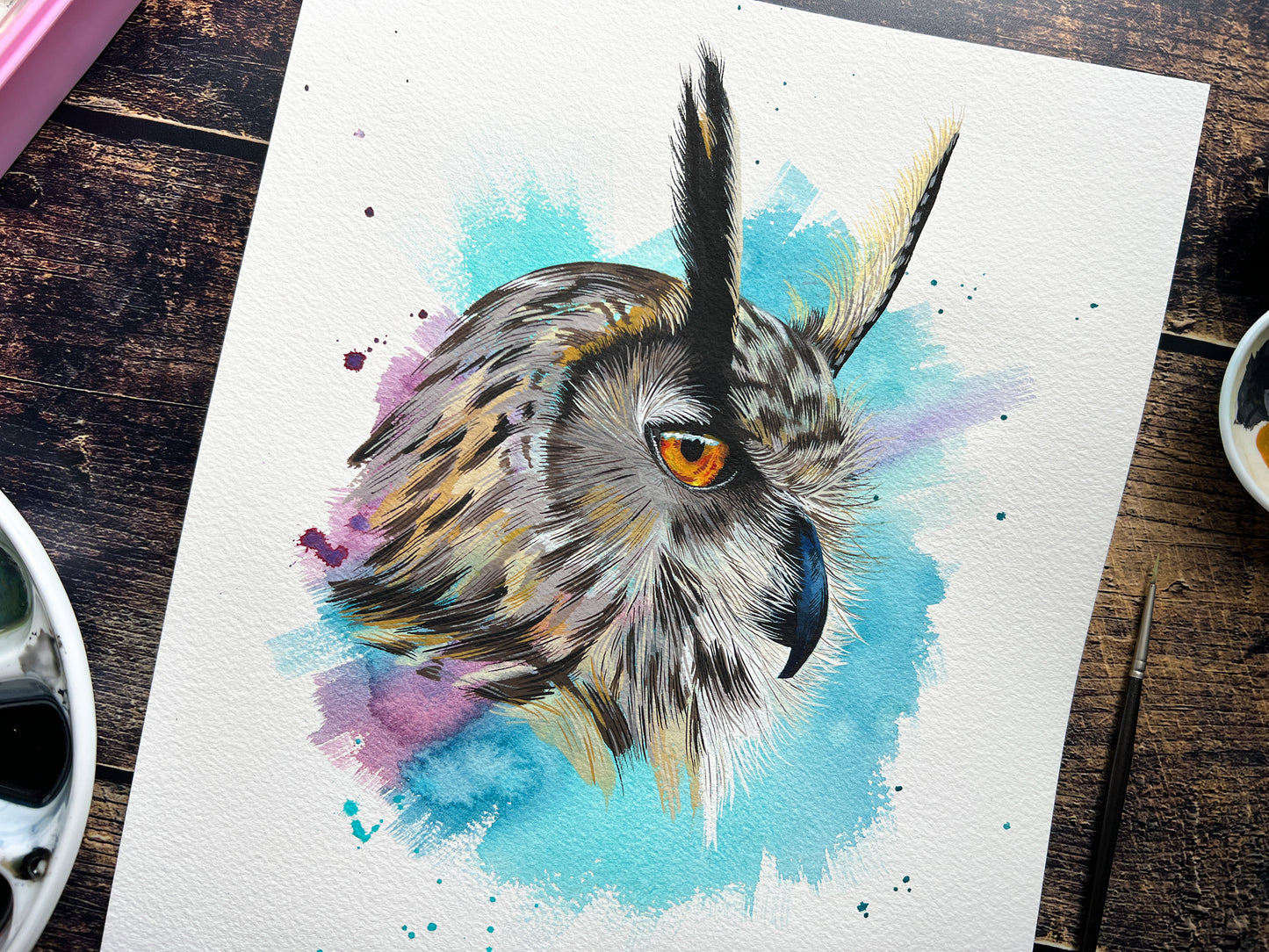 An expressive watercolour & gouache portrait of a long-eared owl