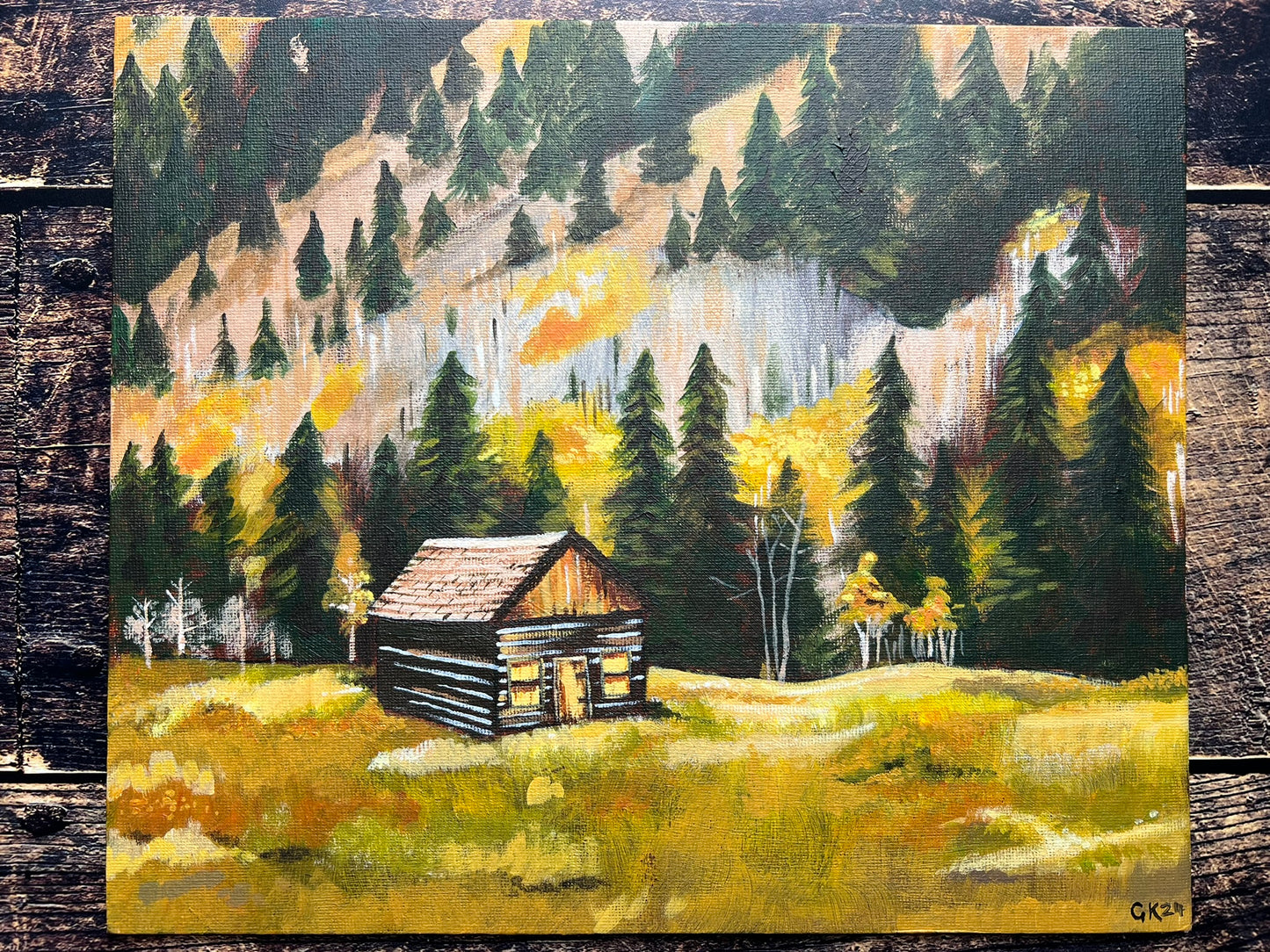 An autumnal expressive painting of a wooden lodge at the foot of a mountain