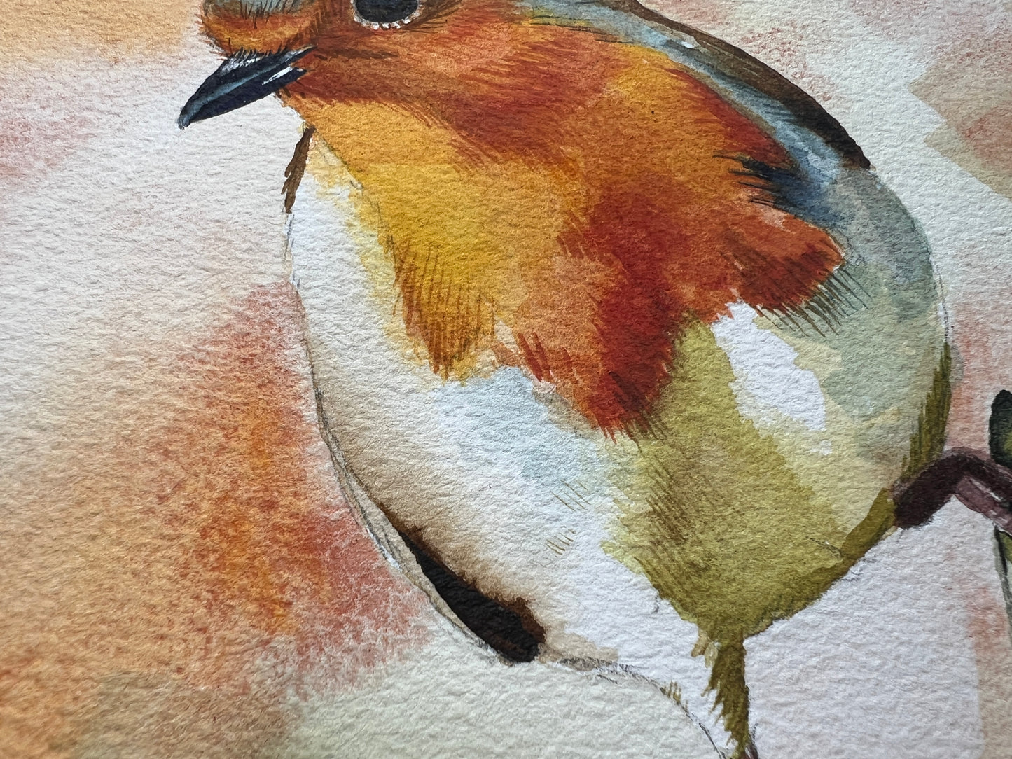 A watercolour painting of a robin, surrounded by blurry autumnal colours.
