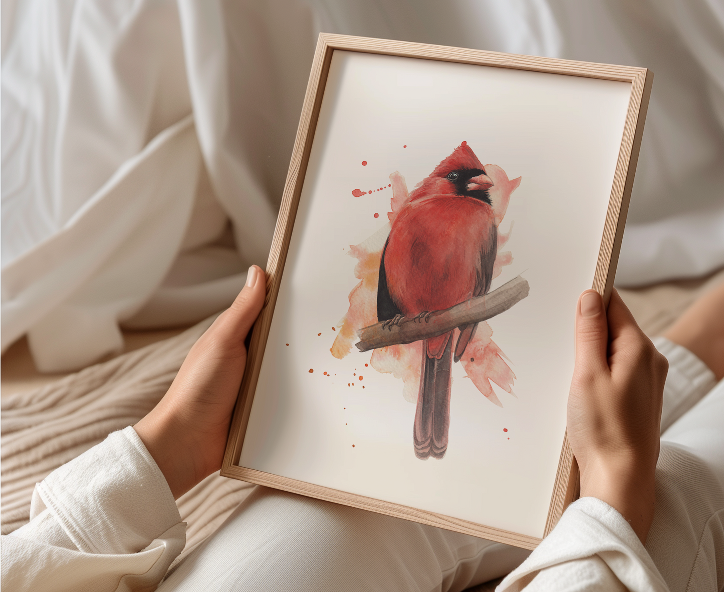 A watercolour print of a male cardinal bird, painted in an expressive way