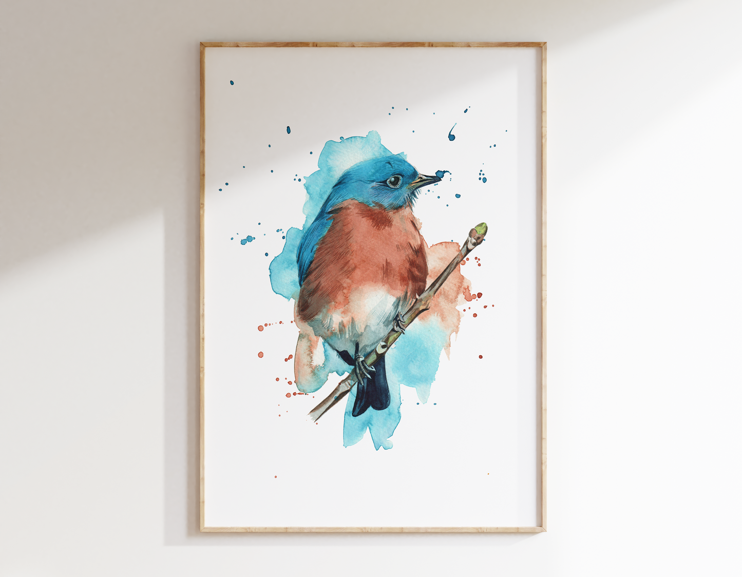 This is a watercolour print of an eastern bluebird, painted in watercolours in an expressive style, complete with watercolour splashes.