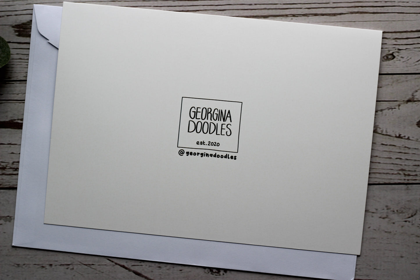 The back of the Lovebirds anniversary card showing the Georgina Doodles logo and established date of 2020
