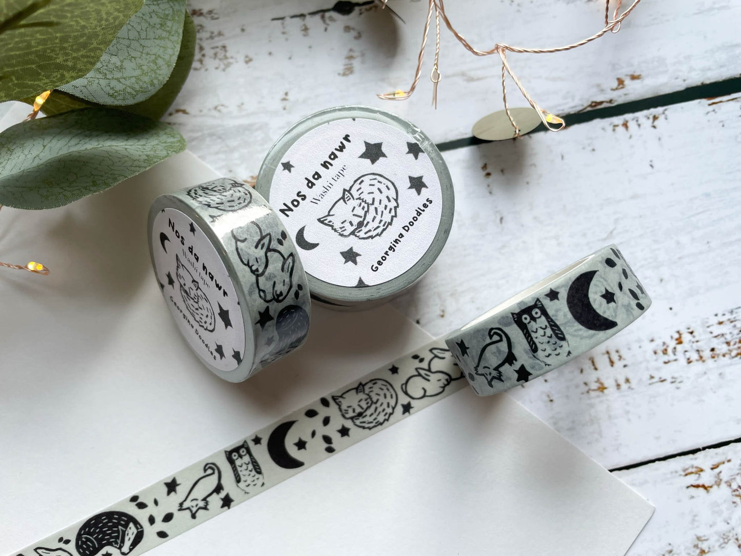 A close up of washi tape that's based on a lino print of woodland animals