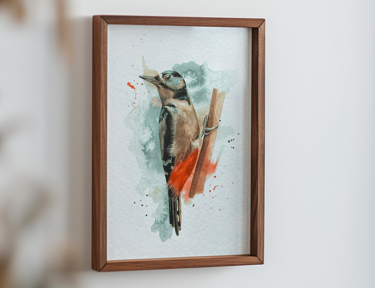 An A4 print of a great spotted woodpecker on textured archival paper.