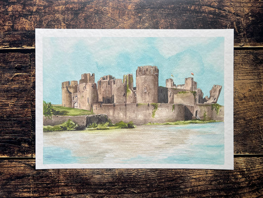A photograph of a watercolour print depicting Caerphilly castle