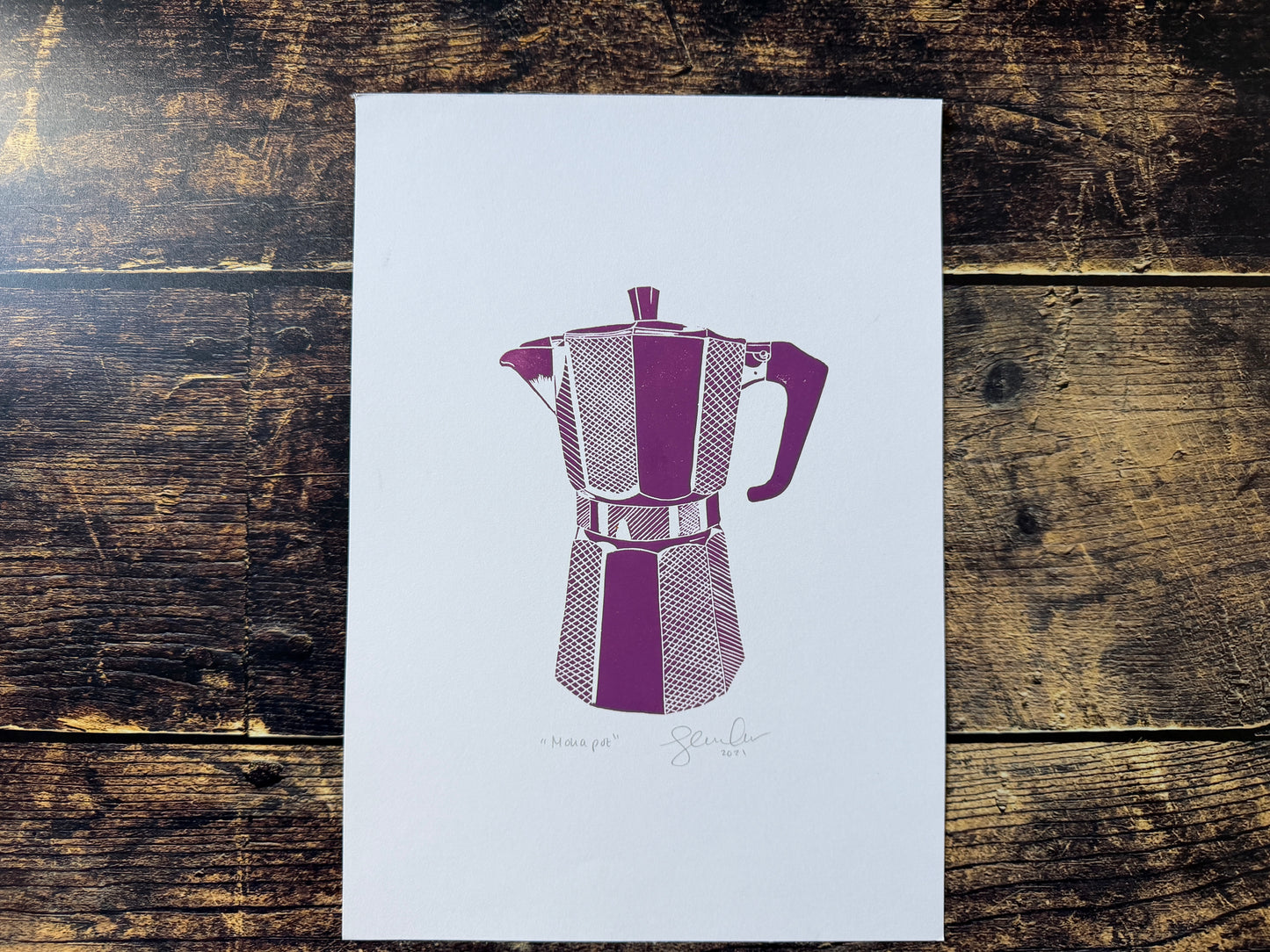 A lino print of a moka pot in purple