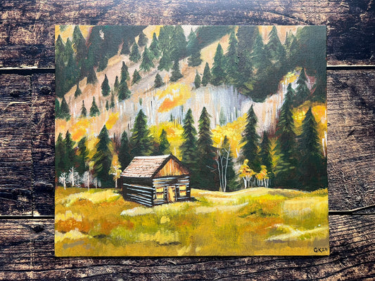 An autumnal expressive painting of a wooden lodge at the foot of a mountain