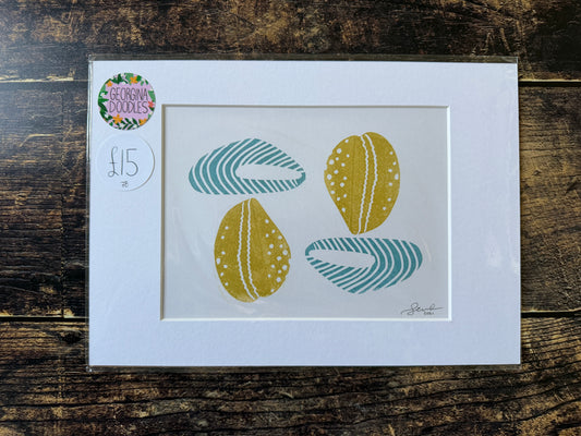 A lino print of four shells