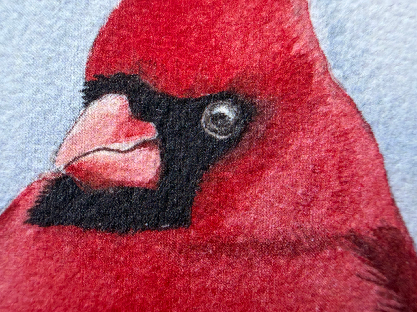 An art print of a male & female cardinal