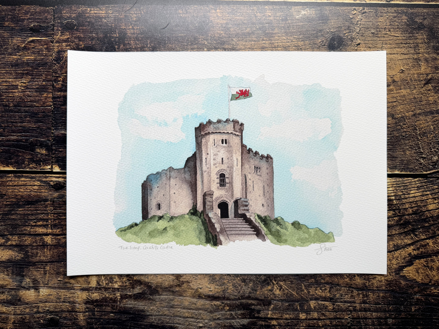 A watercolour print of Cardiff Castle