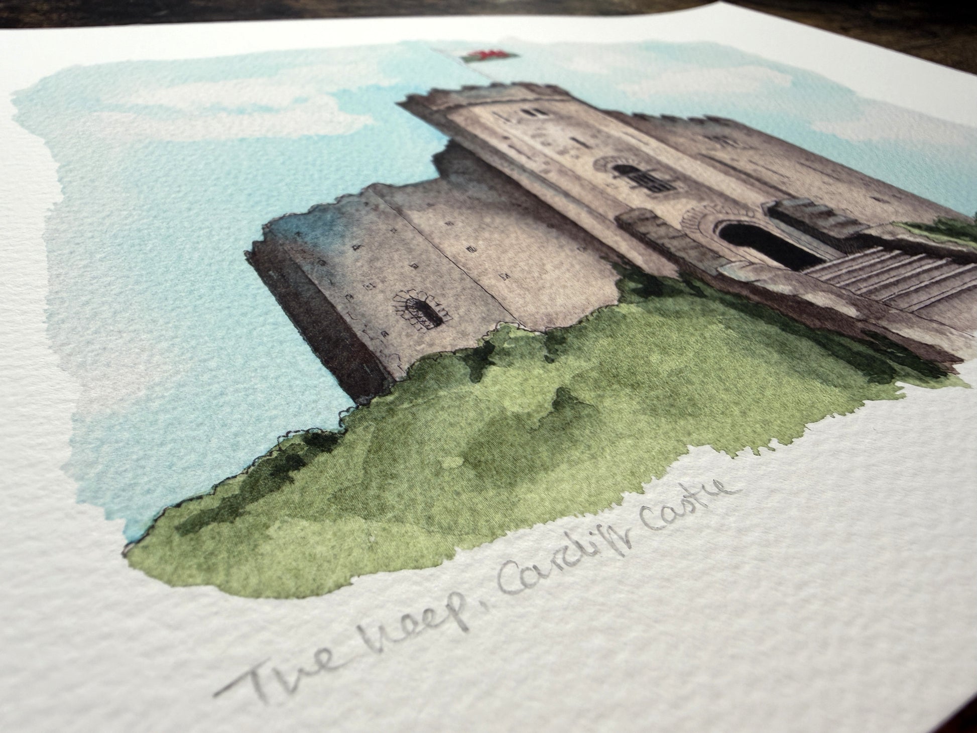 A watercolour print of Cardiff Castle