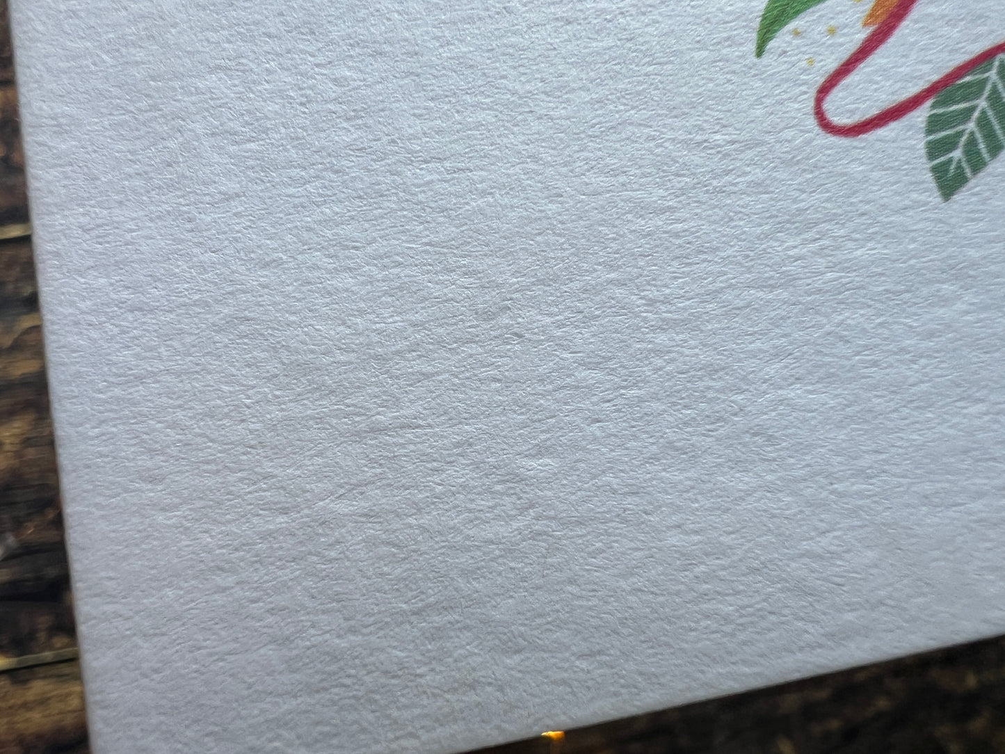 Close-up of textured white card.