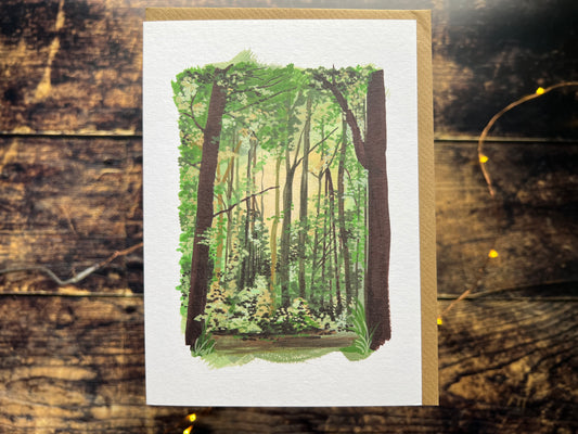 A greetings card featuring a gouache painting of a welsh woodland