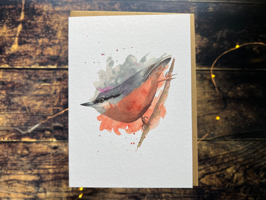 A greetings card of a watercolour nuthatch