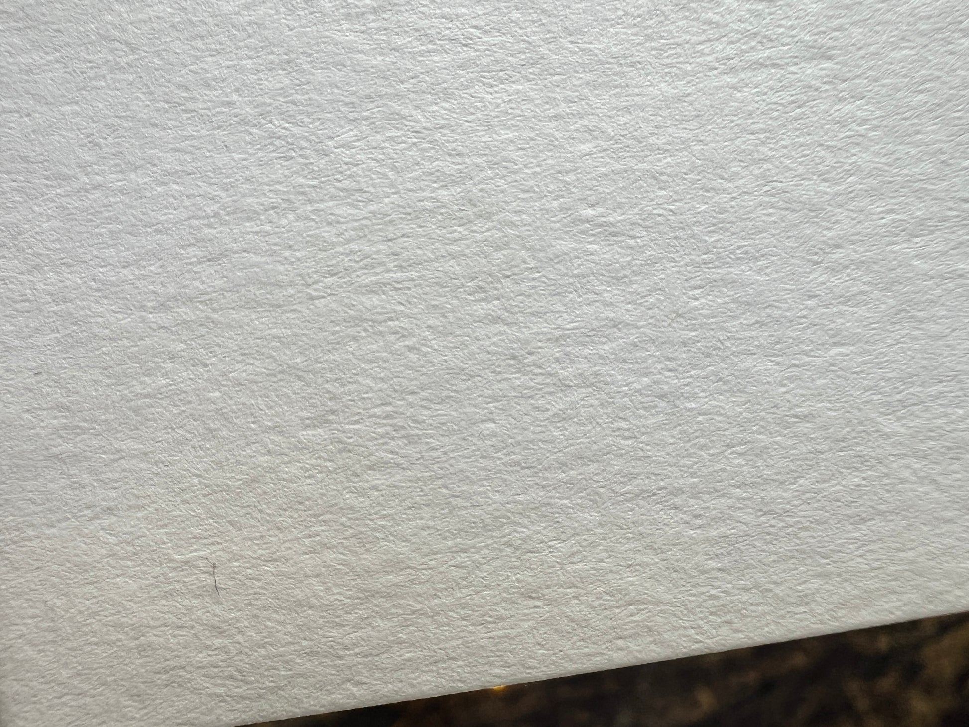 A close up showing the texture of the card
