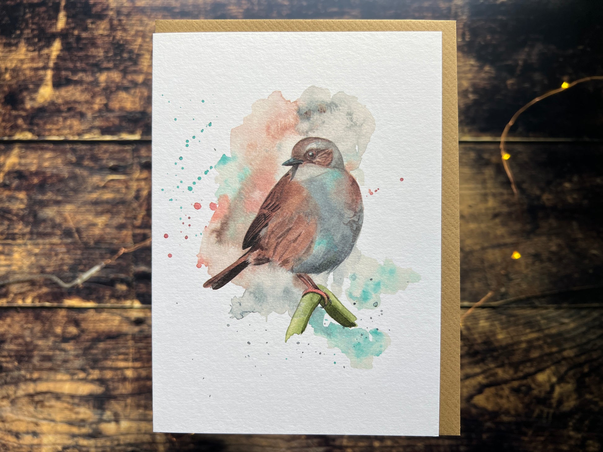 A greetings card featuring a watercolour dunnock