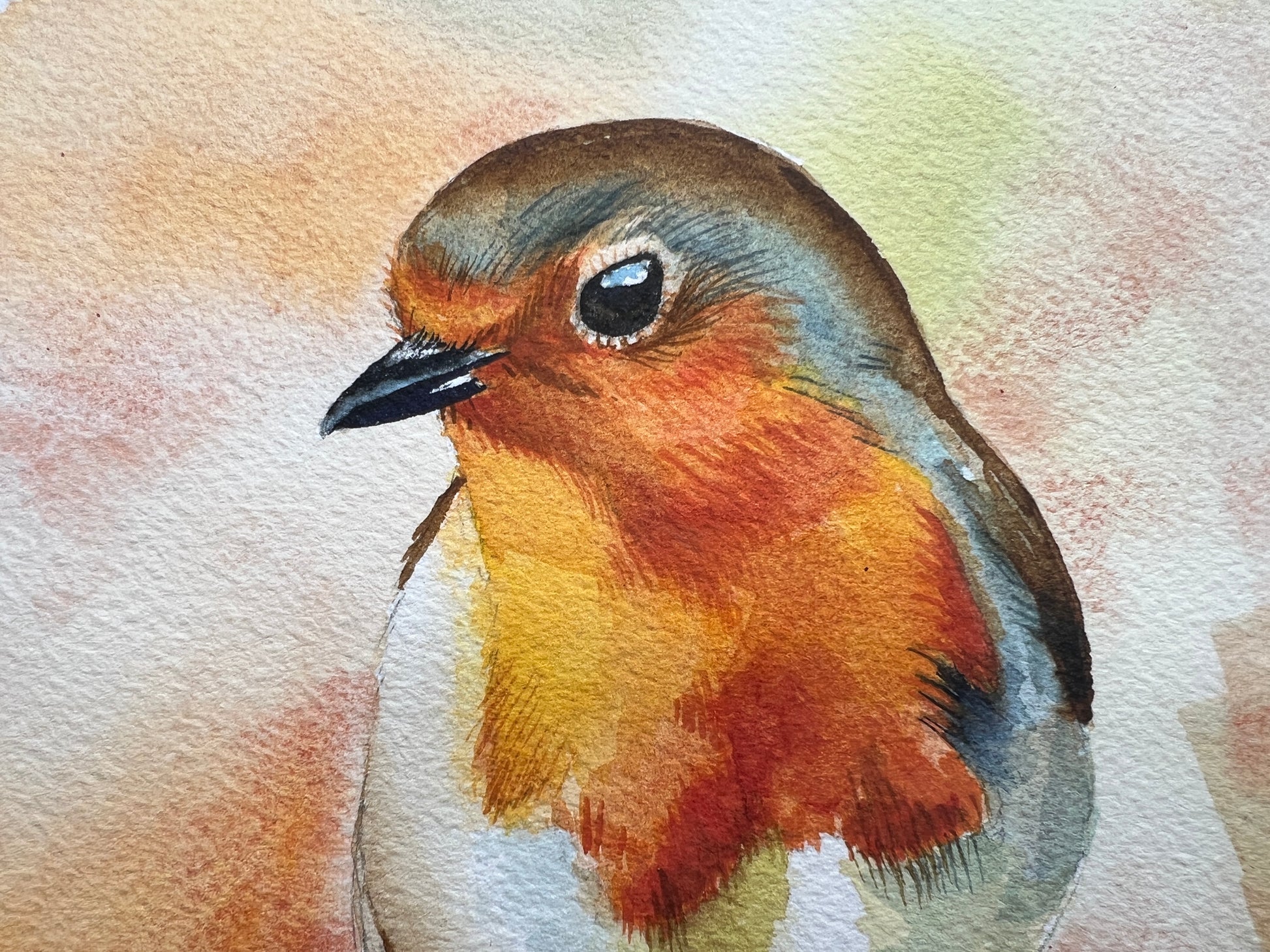 A watercolour painting of a robin, surrounded by blurry autumnal colours.