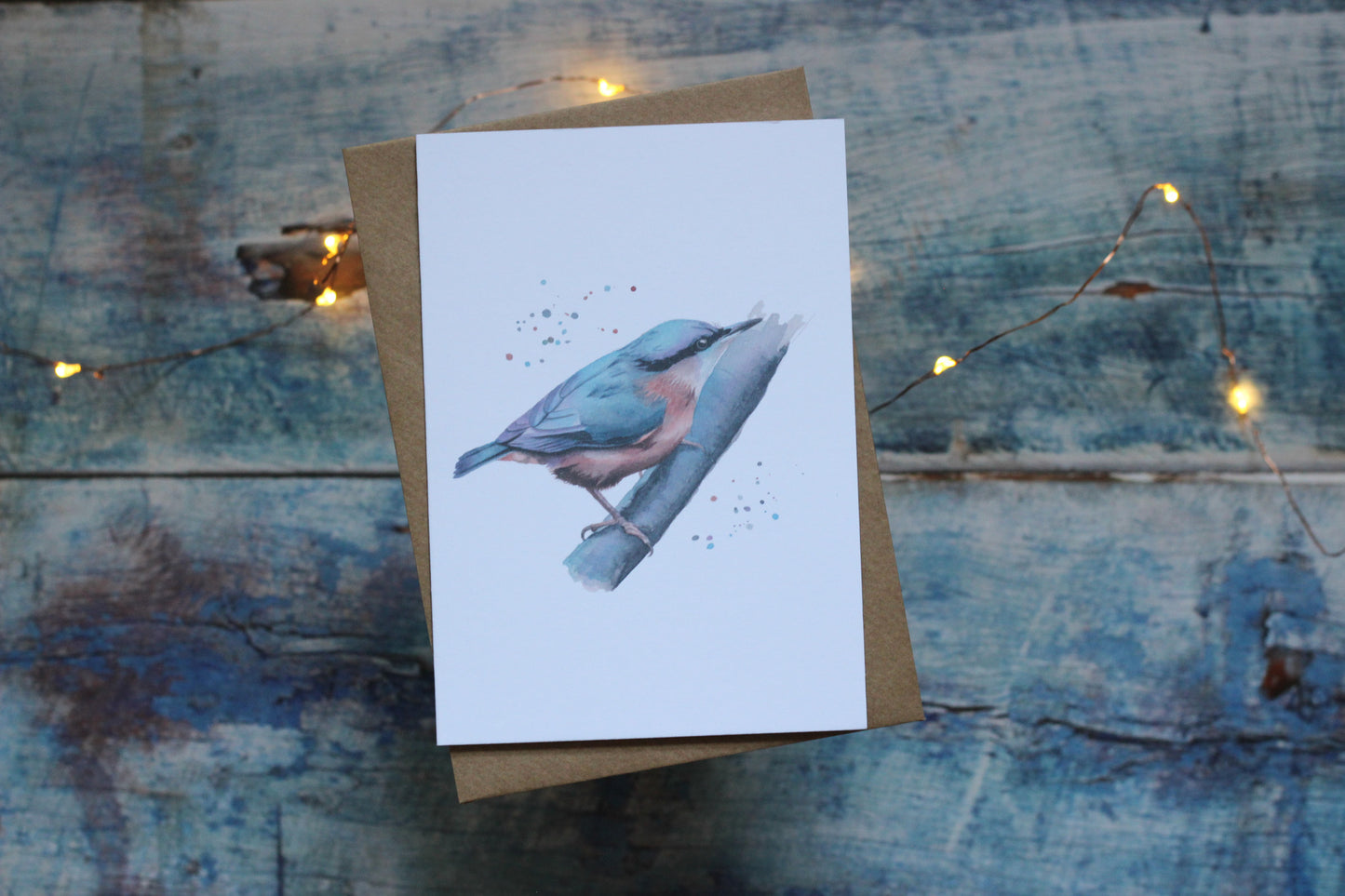 An A6 card and brown kraft envelope featuring a nuthatch