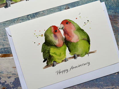 A close up of the watercolour lovebirds anniversary card