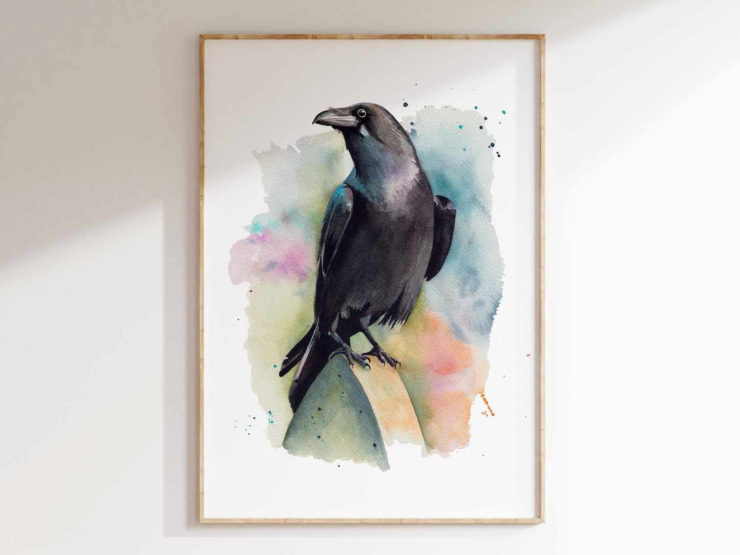 A watercolour print of a raven