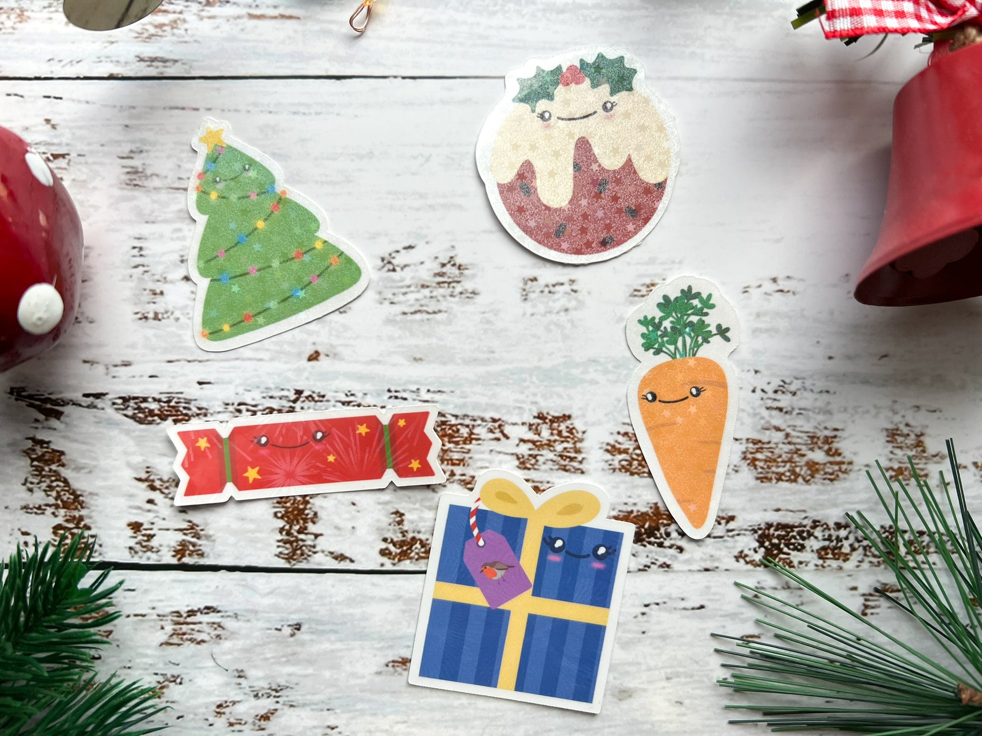 A phot of six cute Christmas stickers with a holographic overlay
