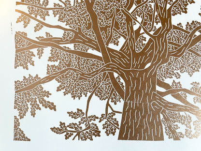 A close up of A lino print of an oak tree as viewed from standing under it and looking up in copper