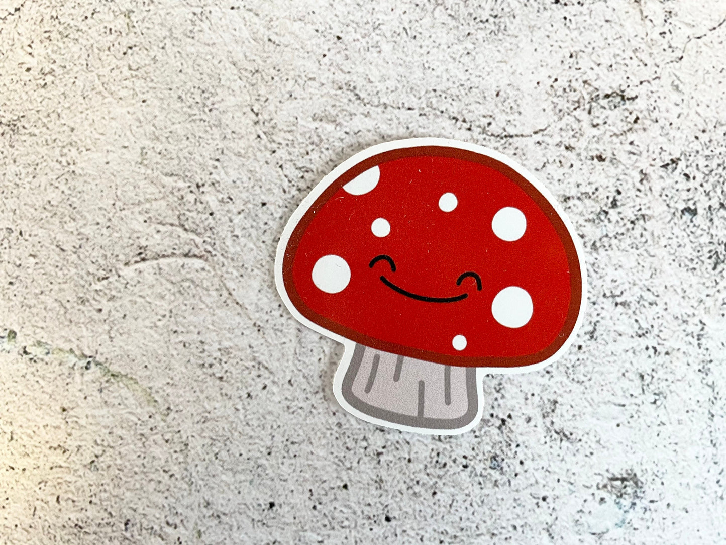A cute 5cm sticker of a red mushroom