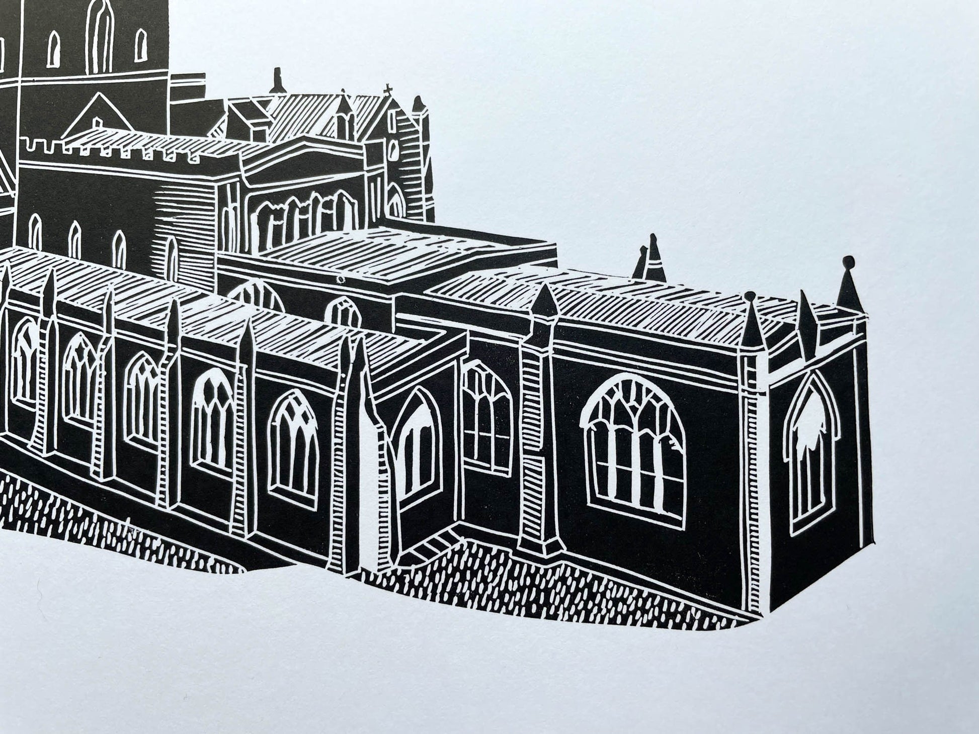 A lino print of St Davids Cathedral in Pembrokeshire in black on A4 white paper