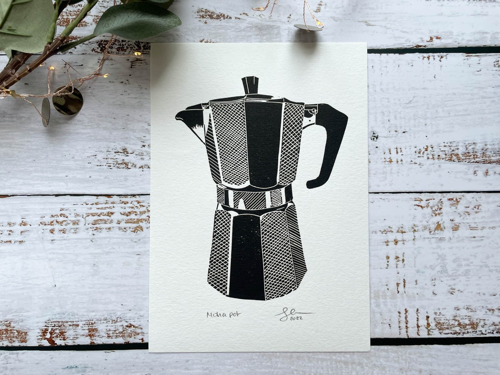 A lino print of a coffee moka pot in black