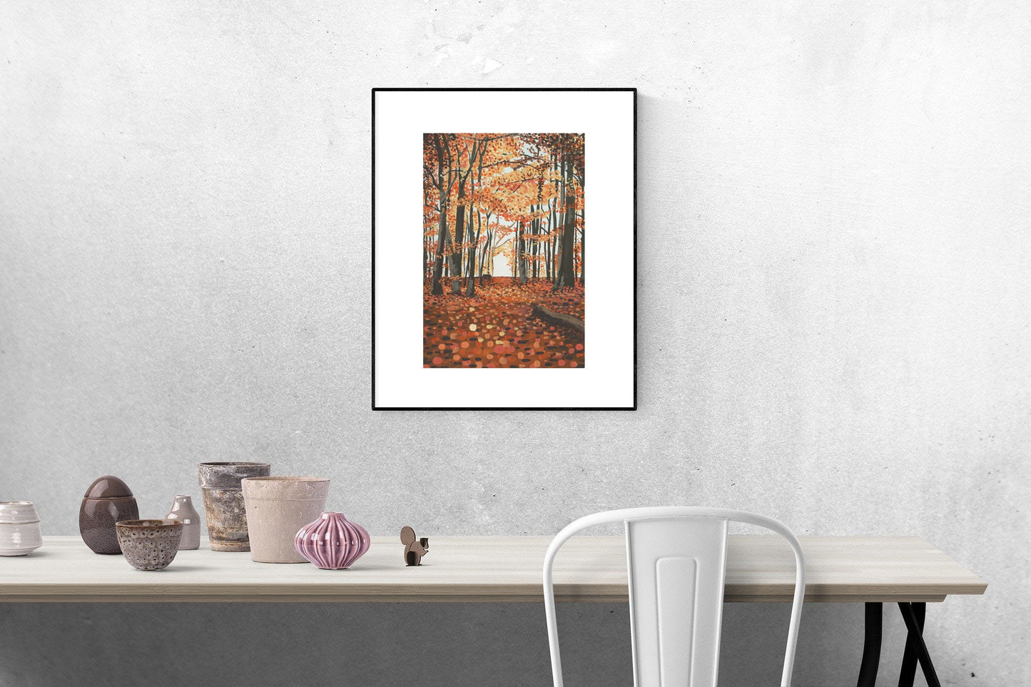 A gouache print of an autumn woodland scene with a slightly abstract ground