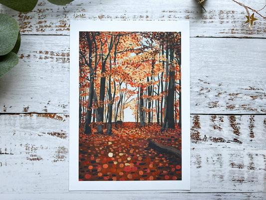 A gouache print of an autumn woodland scene with a slightly abstract ground